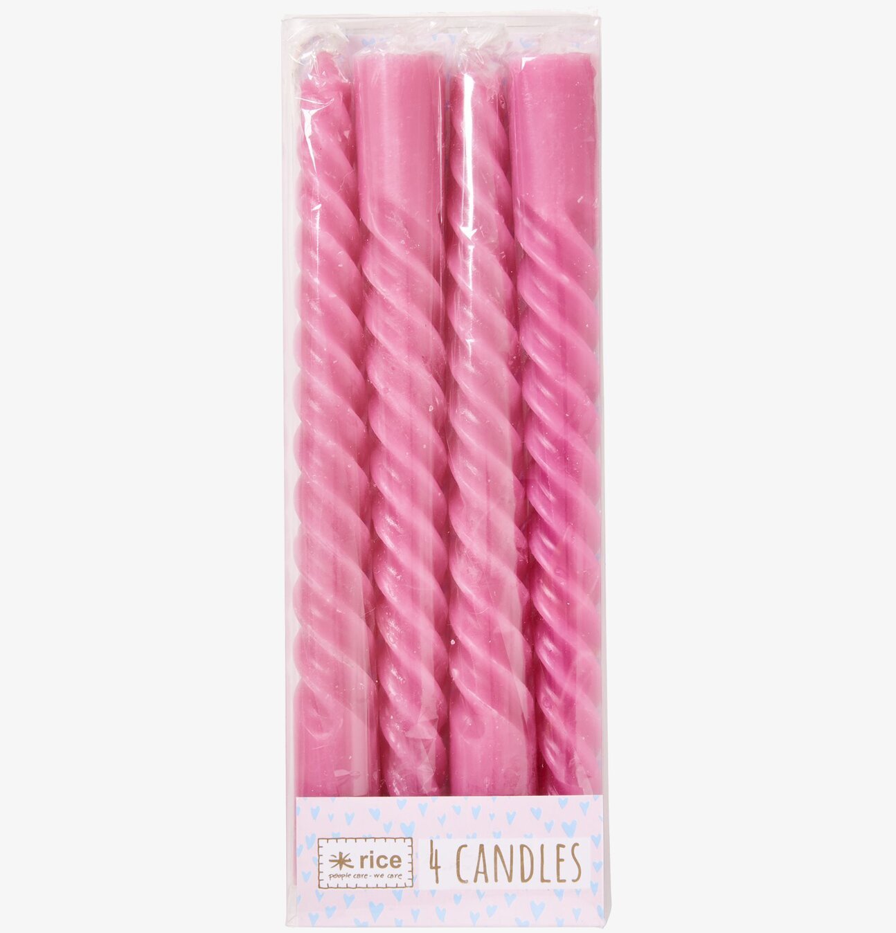 Foto av fyra tvinnade lila stearinljus i förpackning