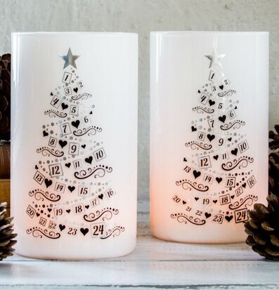 Bild av eleganta ljuslyktor med adventskalenderfunktion