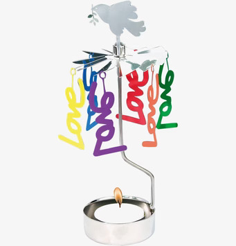 Bild av ett snurrande änglaspel med färgglada dekorationer