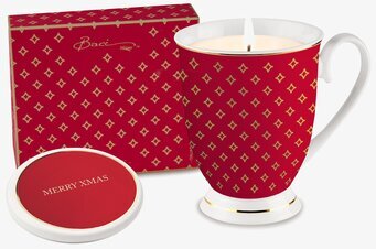 Bild av lyxigt doftljus med juldesign och varm atmosfär