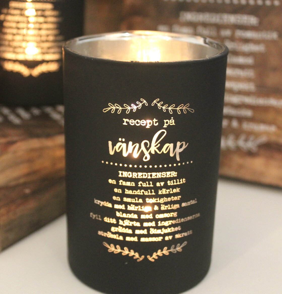 Bild av elegant ljuslykta med inspirerande budskap