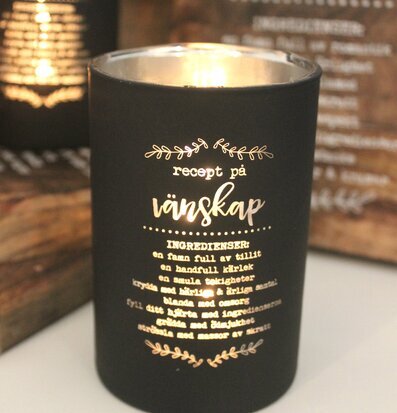 Bild av elegant ljuslykta med inspirerande budskap