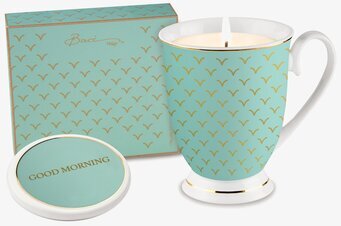 Bild av stilrent doftljus i turkos kopp med guldmönster