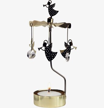 Bild av elegant änglaspel med kristaller och ljus