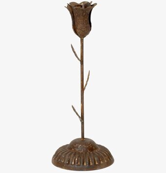 Foto av rustik ljusstake med tulpanformad design