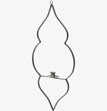 Bild av konstnärligt formgiven ljusstake med vågform