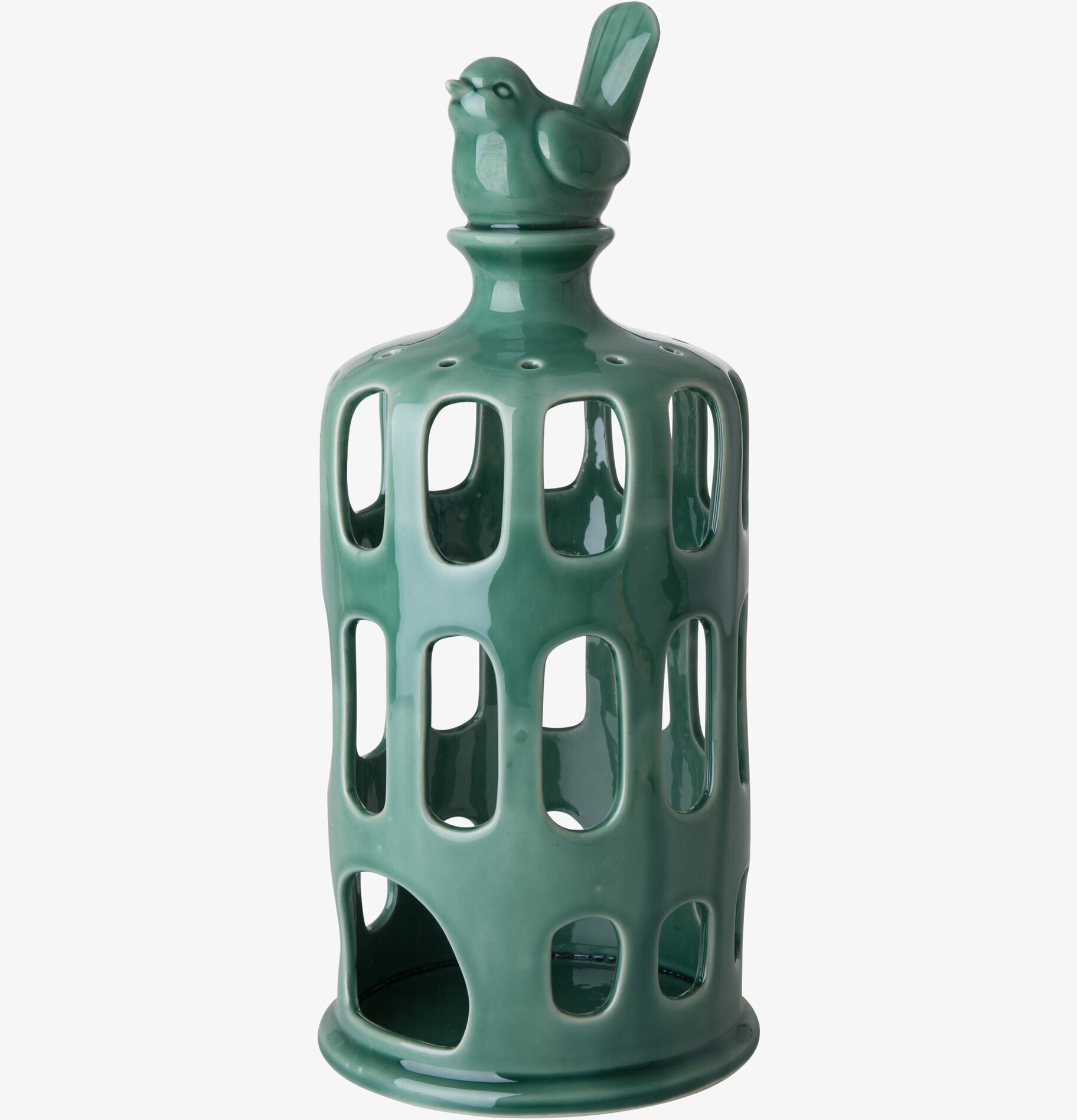 Bild av grön ljuslykta med skulpturalt formspråk