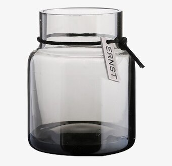 Foto av stilren värmeljuslykta i rökgrå glasdesign