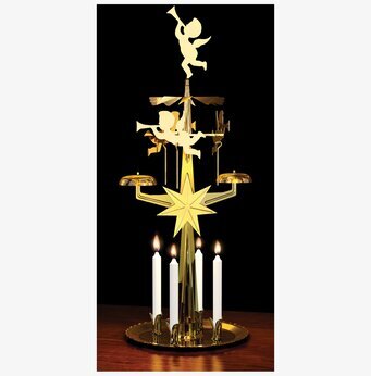 Bild av dekorativt änglaspel i glänsande guldfärg