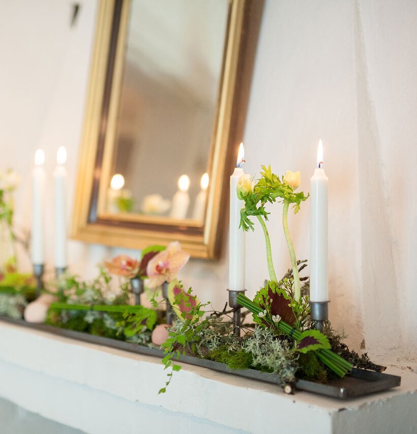 Ljusstake med 10 ljus från I AM Interior på spiselkrans