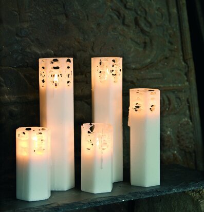 Bild av fascinerande ljuslyktor med spindelnätsmönster