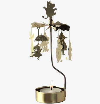 Bild av elegant änglaspel med Muminfigurer i guld