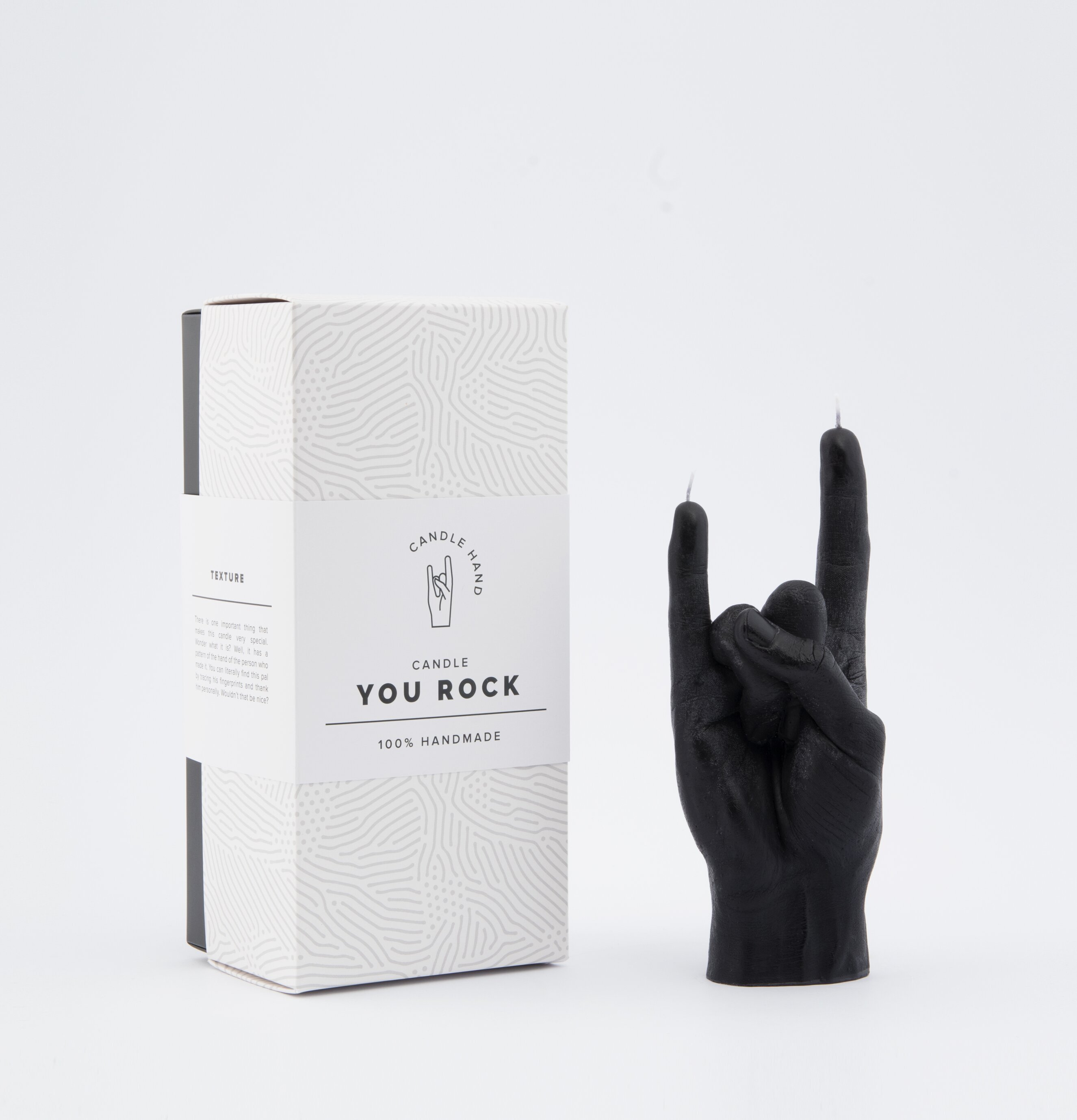 Bild av unik ljuslykta formad som en rockande hand