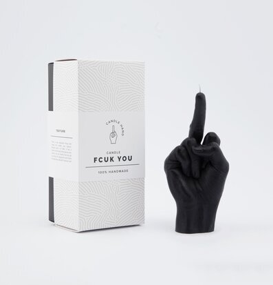 Foto av ett unikt, handformat ljus i svart design