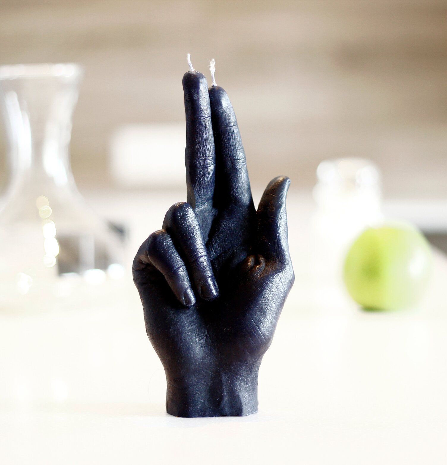 Candle Hand - Gun Finger från Candlehand på vit yta