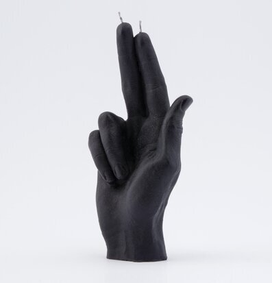 Bild av en detaljerad ljushållare i form av en hand