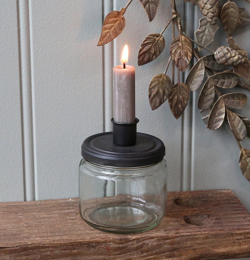 Bild av stilren ljusstake med förvaring och design