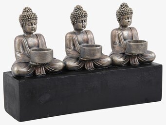 Bild av detaljrik ljushållare med Buddha-figurer