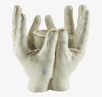 Bild av konstnärlig ljushållare formad som händer