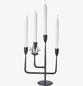 Foto av skulptural ljusstake med fyra ljusarmar