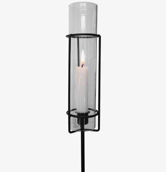 Bild av elegant ljushållare i svart metall och glas