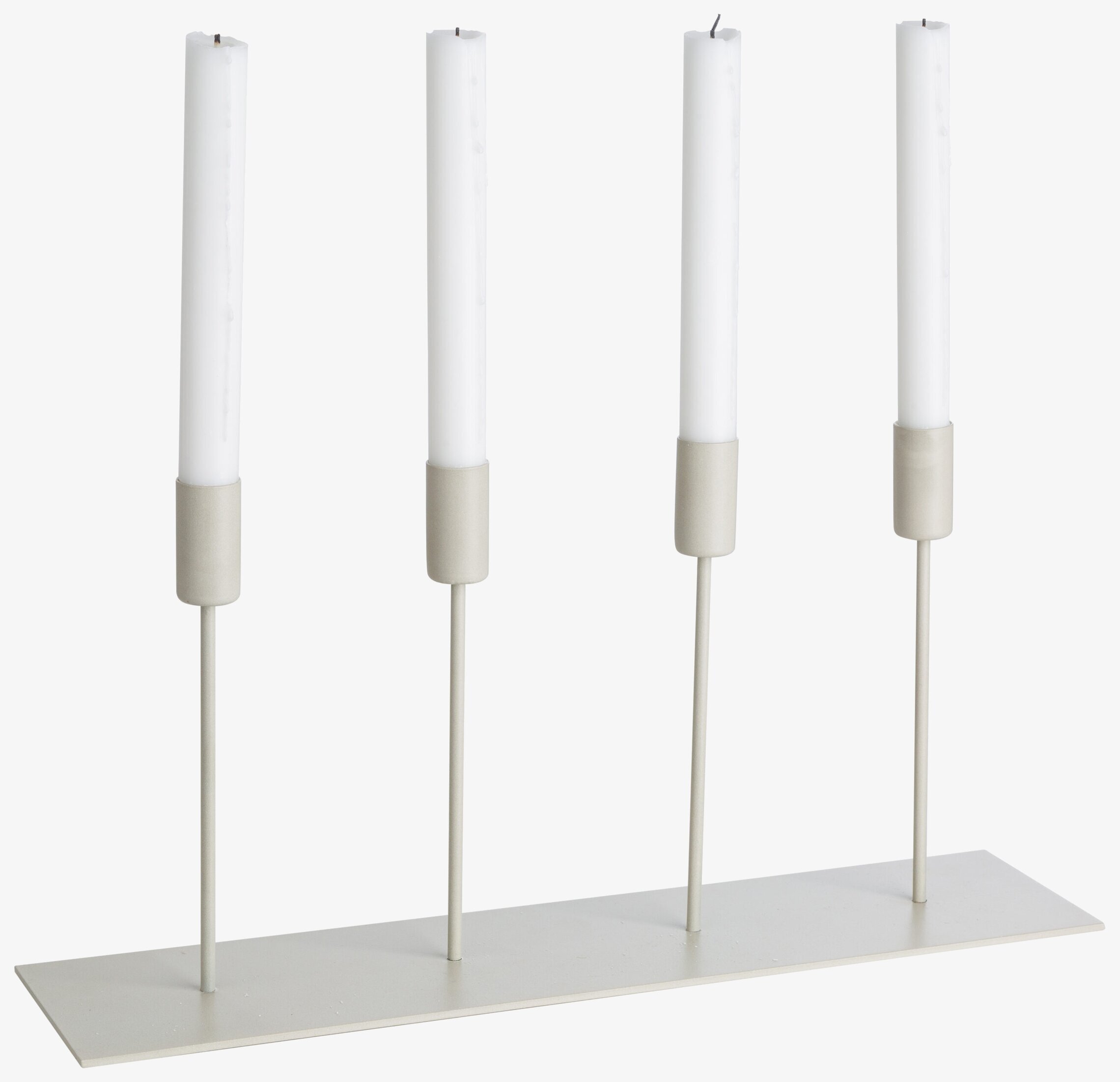 Bild av stilren ljusstake med fyra ljus och beige ton