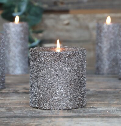 Bild av glittrande blockljus i rustik och lyxig miljö