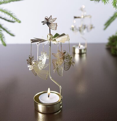 Bild av ett snurrande änglaspel i harmonisk miljö