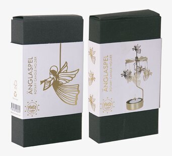 Bild av stilren förpackning med gyllene ängeldesign