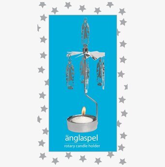 Foto av dekorativ ljuslykta med himmelskt tema