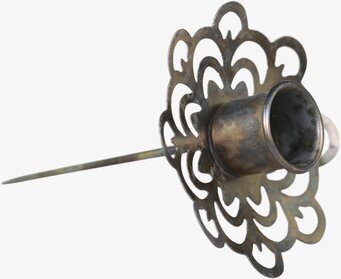 Foto av antik mässing ljushållare med spjutdesign