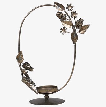 Bild av dekorativ ljuslykta med antik metallfinish