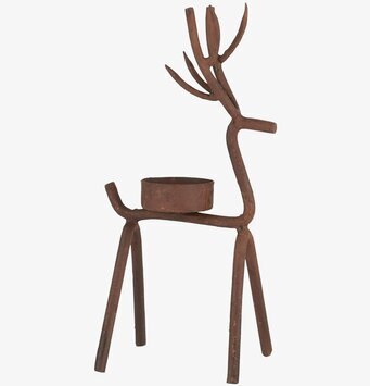 Foto av dekorativ ljusstake med ren i rostbrun nyans