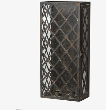 Foto av stilren väggljusstake med metallgaller