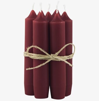 Foto av åtta djupt rödbruna stearinljus med rosett