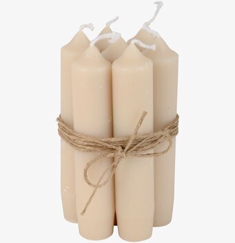 Foto av sex sandfärgade stearinljus med hamparep