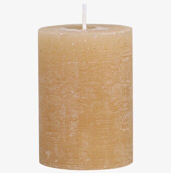 Bild av rustikt blockljus med honungsfärg och textur