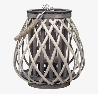 Foto av elegant ljuslykta med flätad pilstruktur