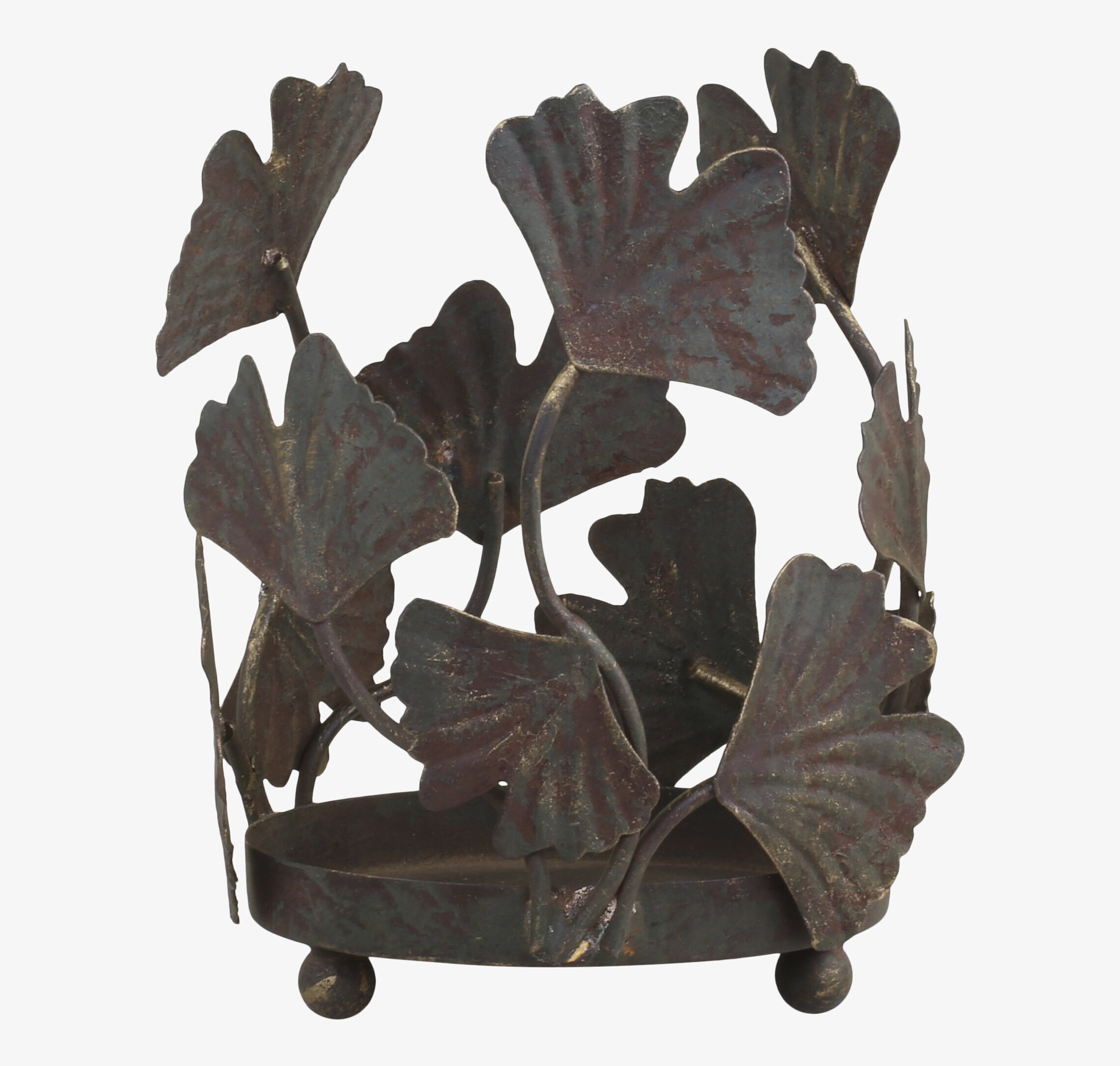 Bild av ljusstake med unik bladdekor och antik finish