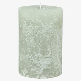 Bild av grönt rustikt blockljus med tidlös design