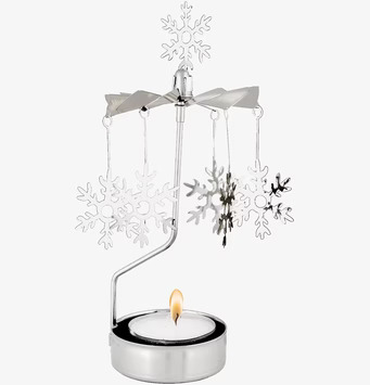 Bild av änglaspel med snöflingor i skimrande metall