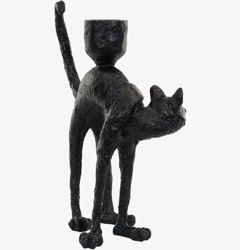 Bild av detaljrik ljusstake med kattdesign