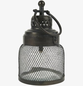 Bild av detaljrik ljuslykta med industriell design