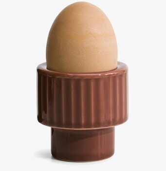 Bild av stilren äggkopp i terrakottafärg