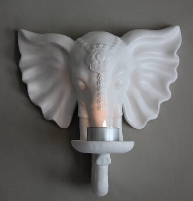 Bild av elegant ljushållare i form av elefanthuvud