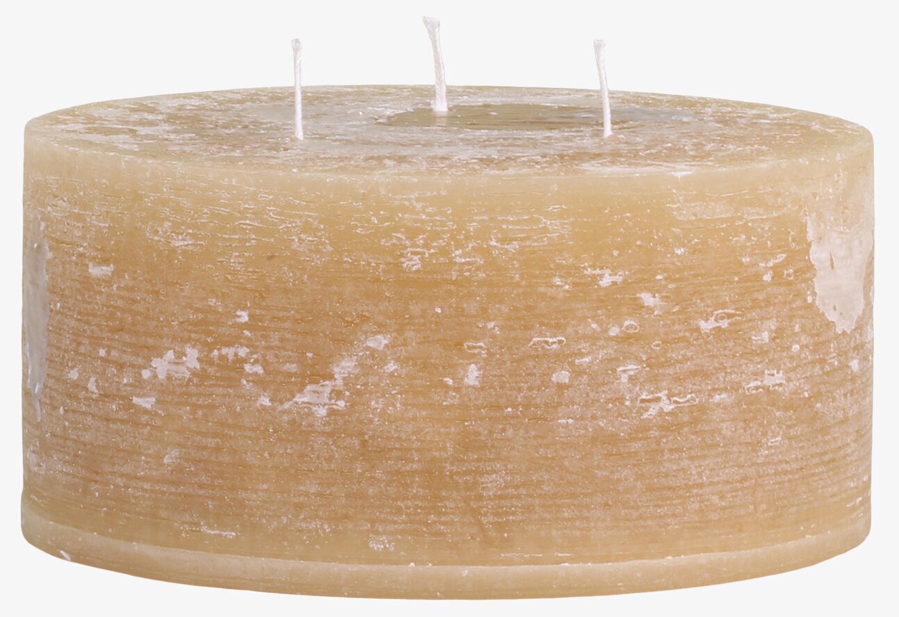 Bild av rustikt blockljus med tre symmetriska veker