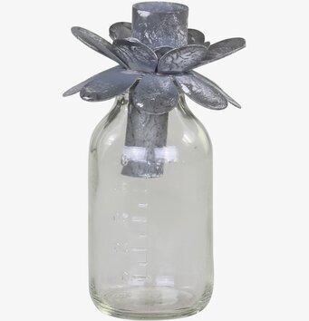 Bild av dekorativ ljushållare i glas och metall