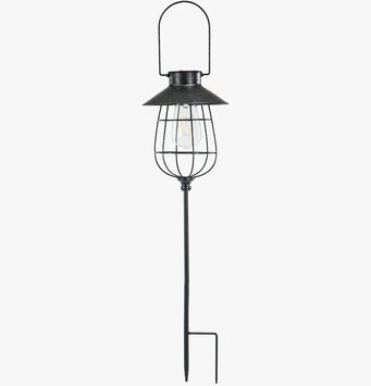 Foto av solcellsdriven LED-lampa med stålstruktur