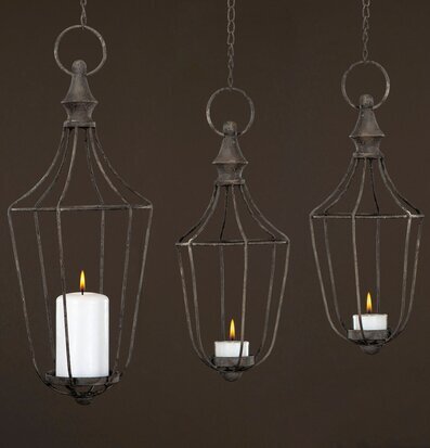 Bild av stilfulla ljushållare med rustik charm