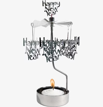 Foto av elegant ljuslykta med snurrande änglaspel